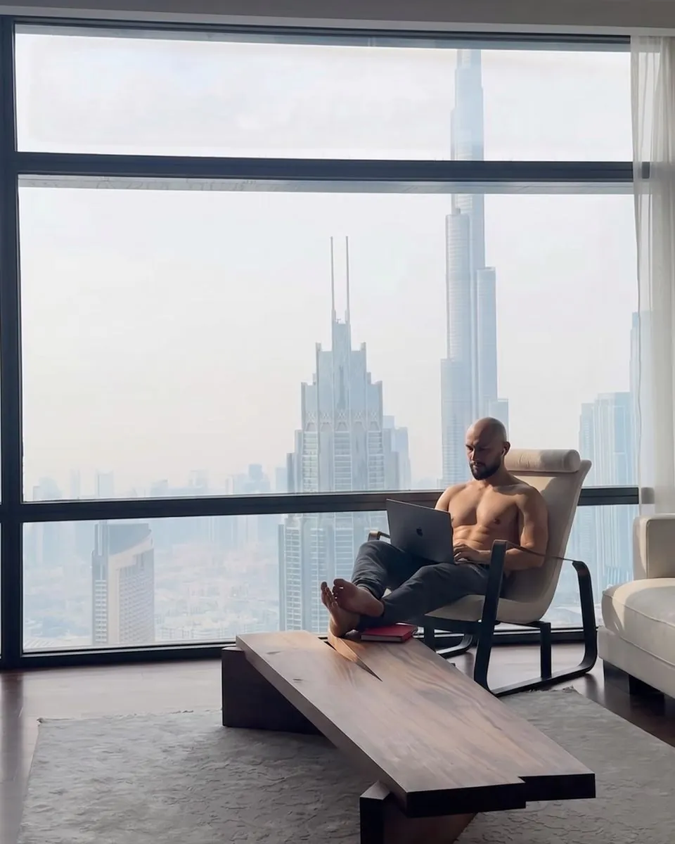 Solano Management creator working from a skyline apartment